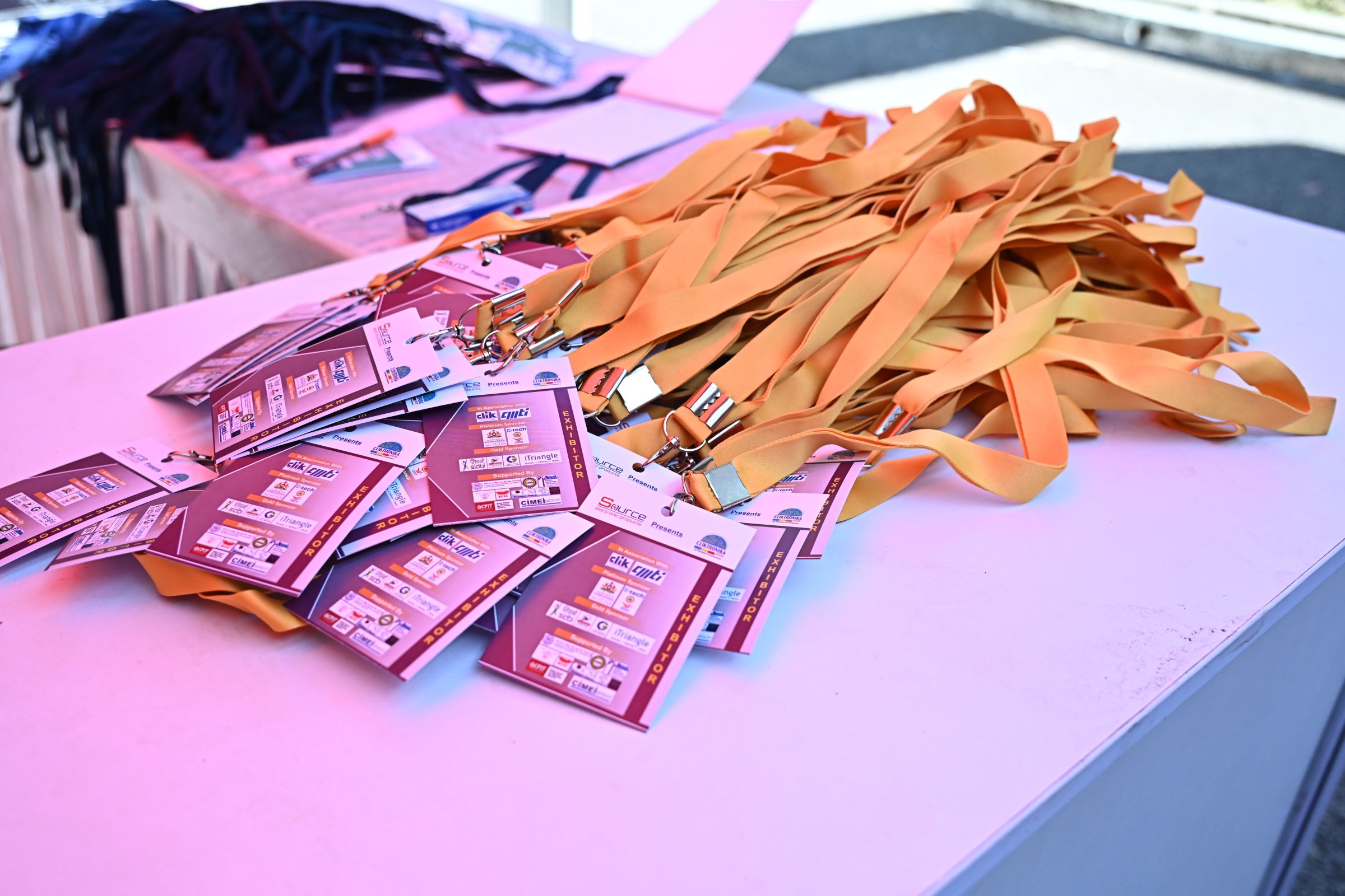 Visitor and exhibitor badges at CLIKTRONIKA 2025