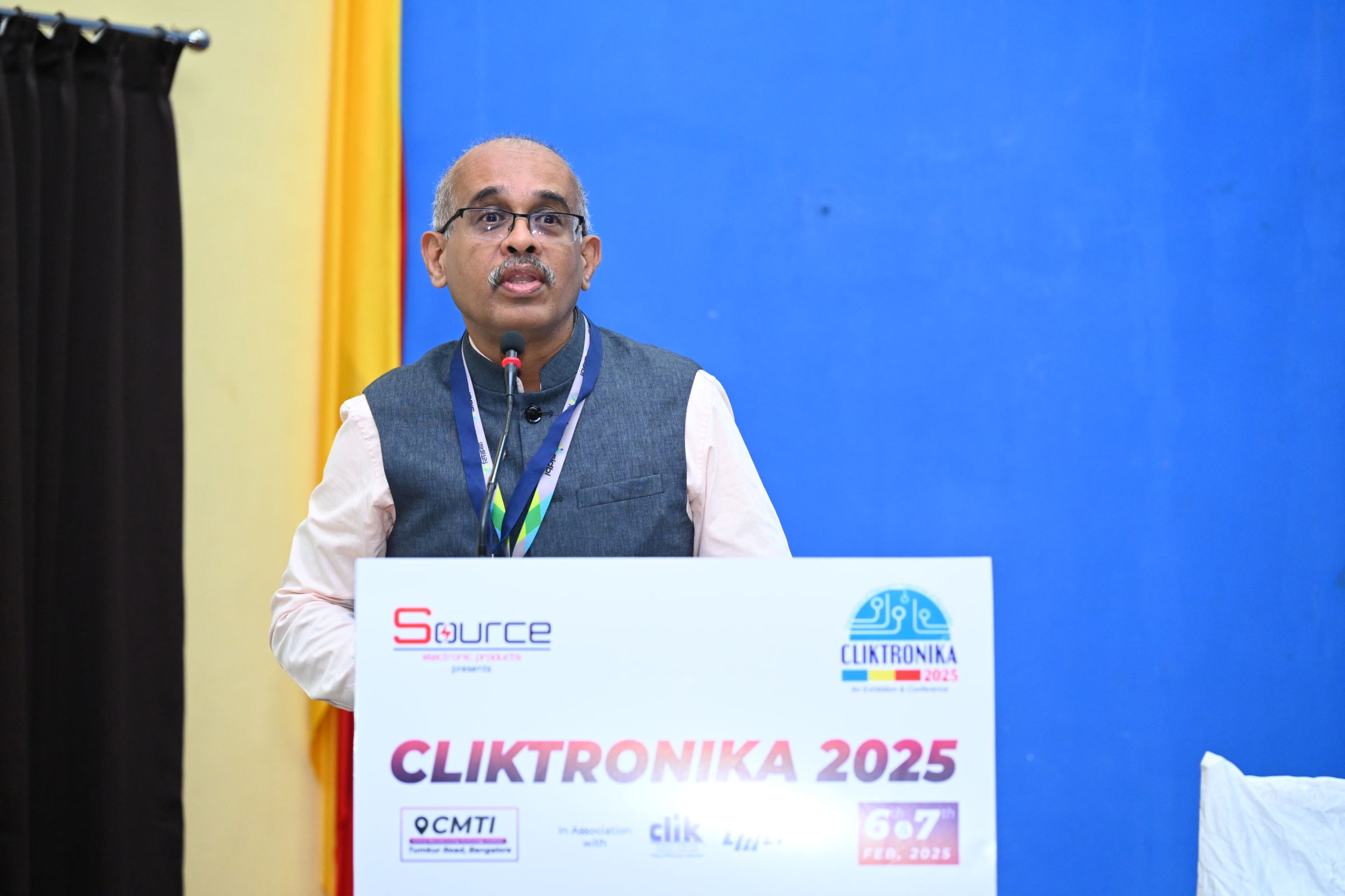 Speaker addressing CLIKTRONIKA 2025 audience