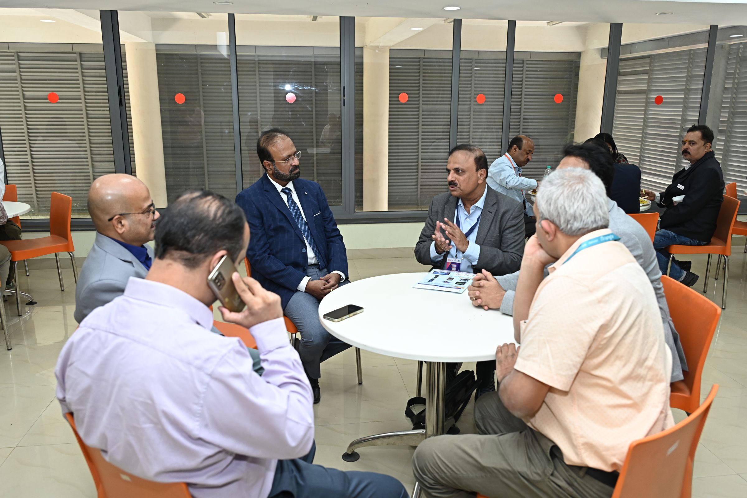 Business networking discussion at CLIKTRONIKA 2025